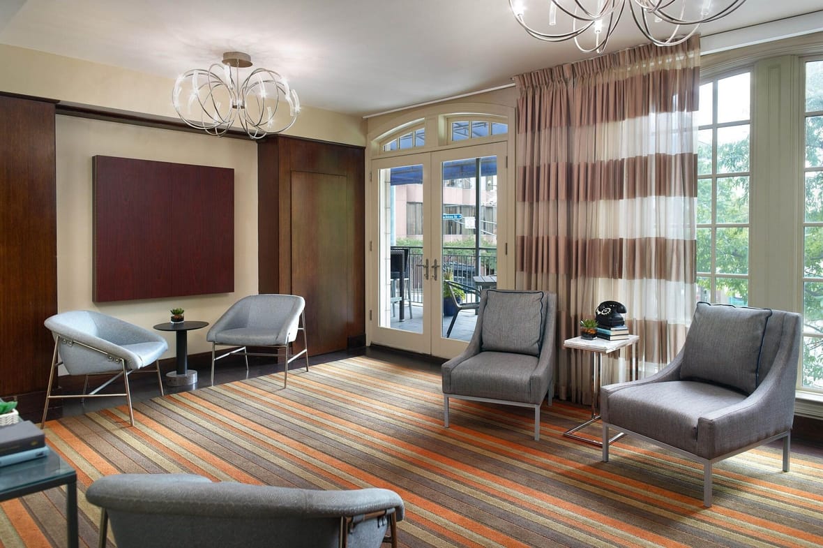 Ellis Hotel lobby lounge with tall windows