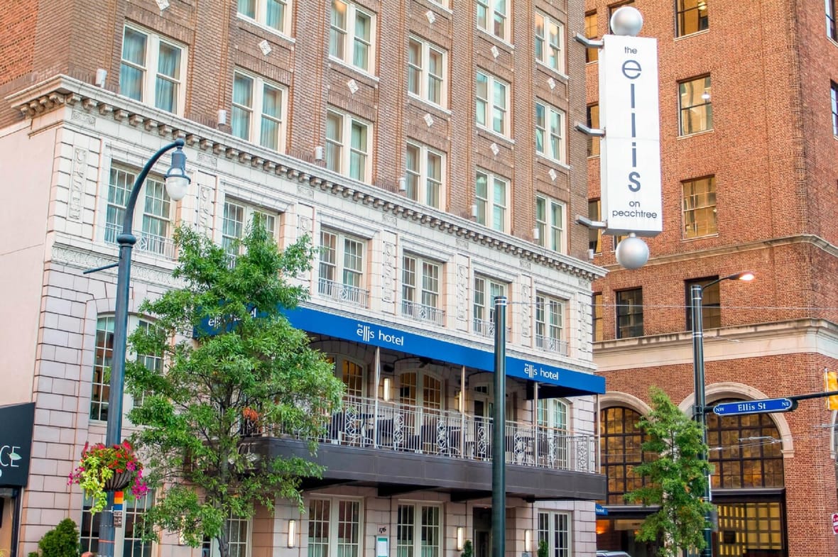 Ellis Hotel facade with vertical 'the ellis on peachtree' sign