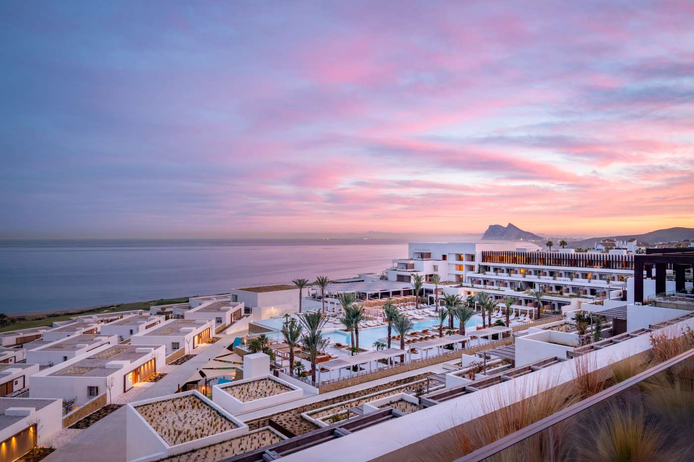 Swimming pool and sunset Fairmont La Hacienda Hotel ,  La Alcaidesa,  Andalucia. Spain