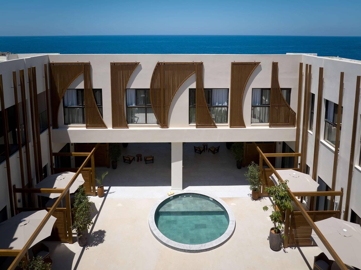 Isla-Brown-Chania--Curio-Collection-by-Hilton-Pool-7