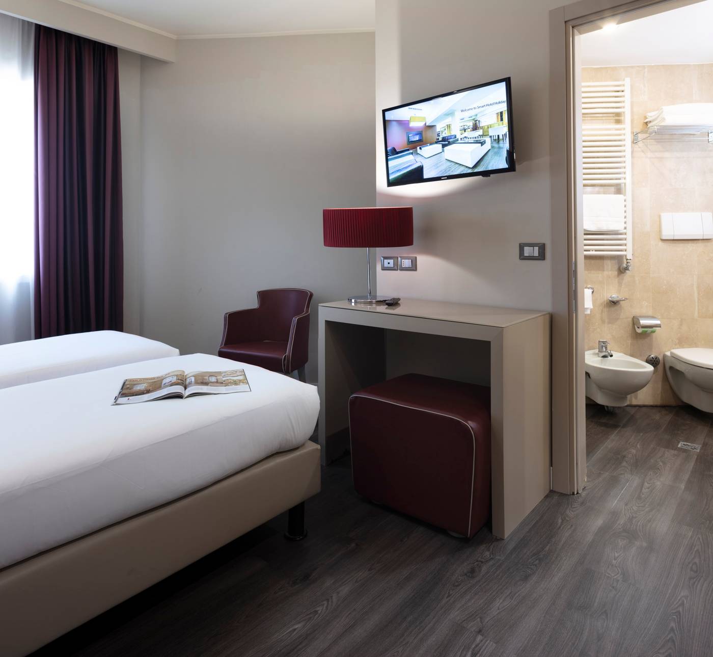 Smart-Hotel-Holiday-Room-26