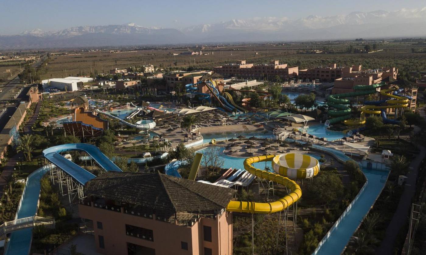 Birds eye view shot of the entire Aqua Fun Club resort showcasing how big the resort is including the large pools and waterslides throughout.