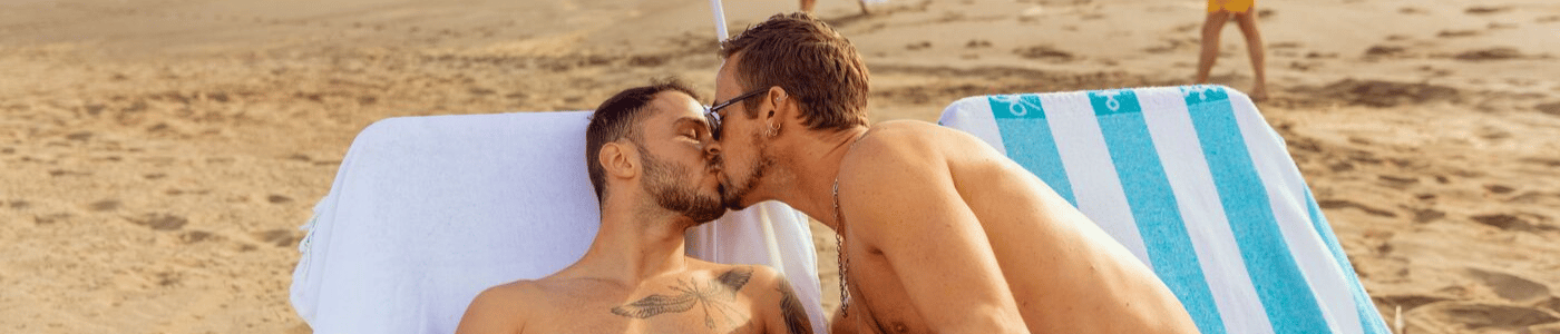 Couple kissing on the beach