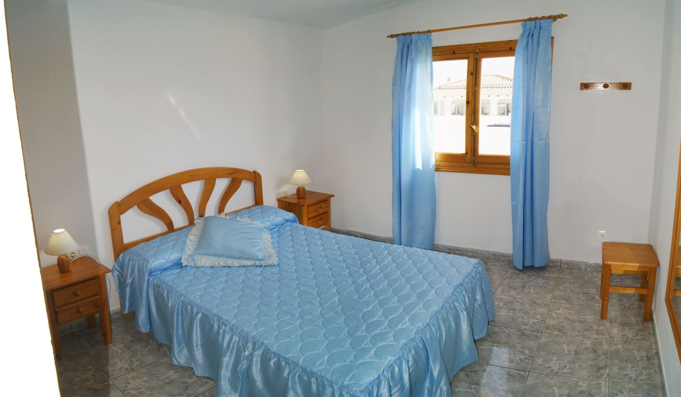 Calan Porter Playa Apartments