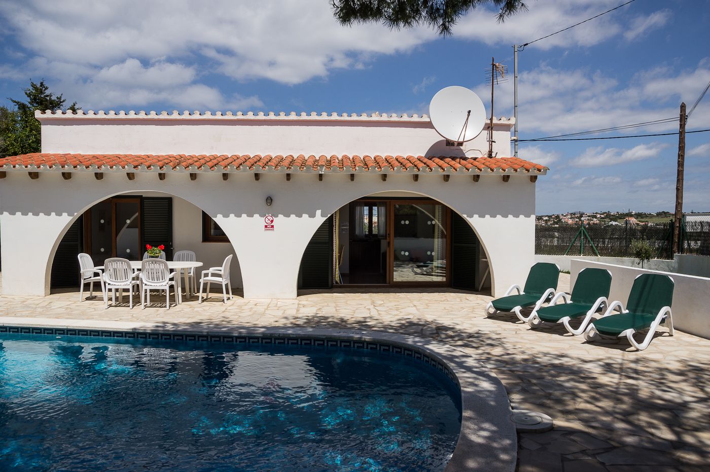 Calan Porter Playa Apartments