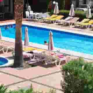 Sandy's Studios & Log Villas, 2 of 5